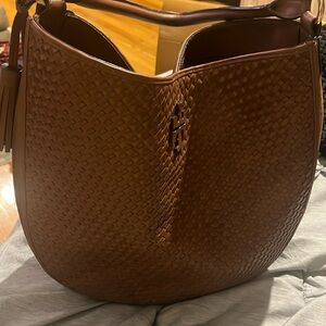 Tory Burch camel color bag with tassel